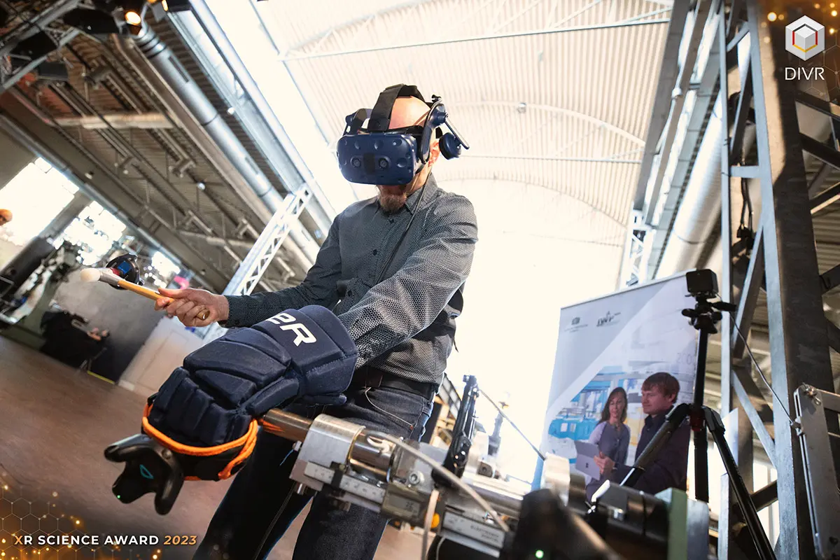 The patented hammering force feedback device in action at DIVR 2023